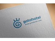 В основе логотипа буква G, плюс три лучика - солнце или корона, спираль - это с...