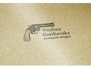 Второй вариант логотипа "пистолет слева от имени и фамилии".