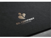 В основе графический элемент из капель нефти, ассоциируется с фонтаном нефти и ...