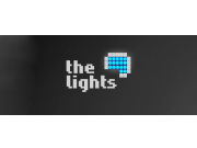 Логотип выполнен в пиксельном стиле. Надпись, "the lights" умышленно разделена ...